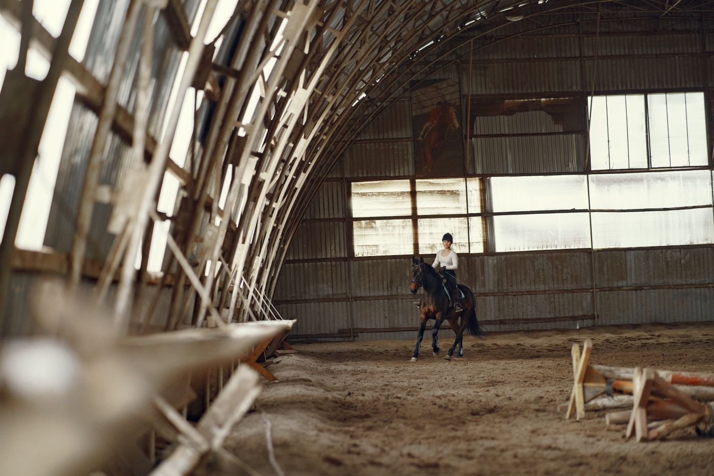 Rider in covered riding arena
